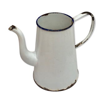 Old white enamelled broc