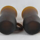 pair of small brown glass cups