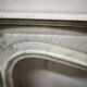 Louis XV style fireplace in veined white marble, 20th century.