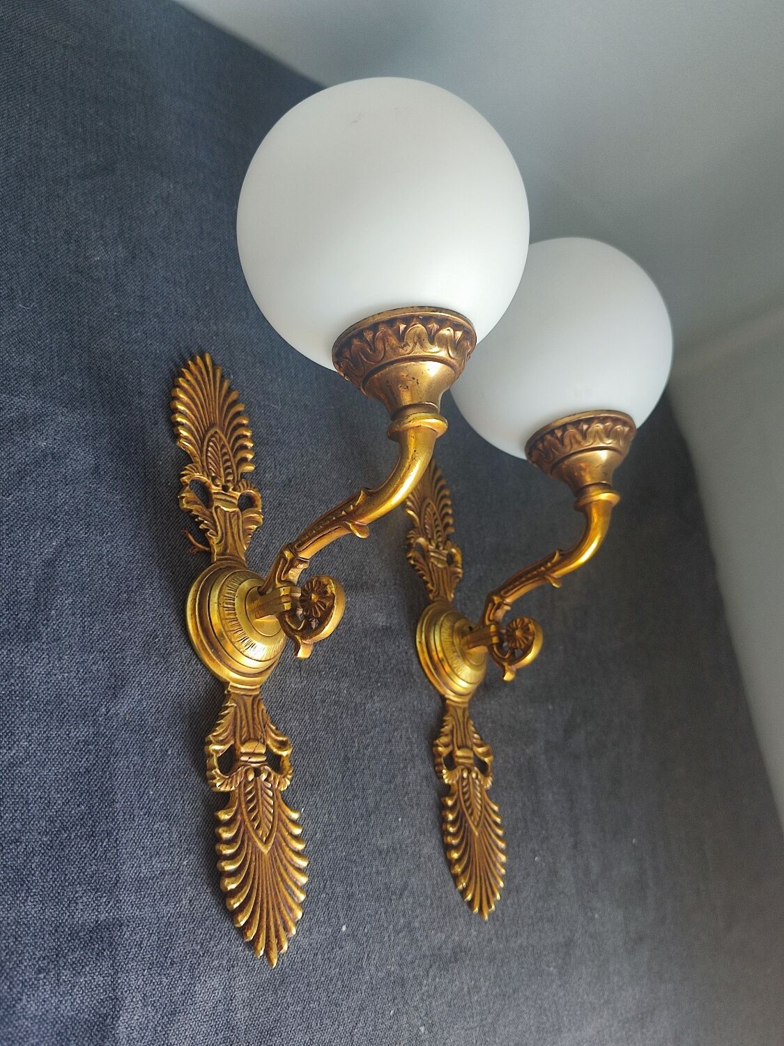 Pair of vintage brass and opaline wall lights