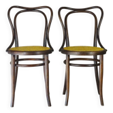 Deux chaises KOHN N°55 de Ca. 1900 cannées, teinte acajou américain.