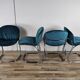Four 1970s tubular chairs upholstered in blue velvet