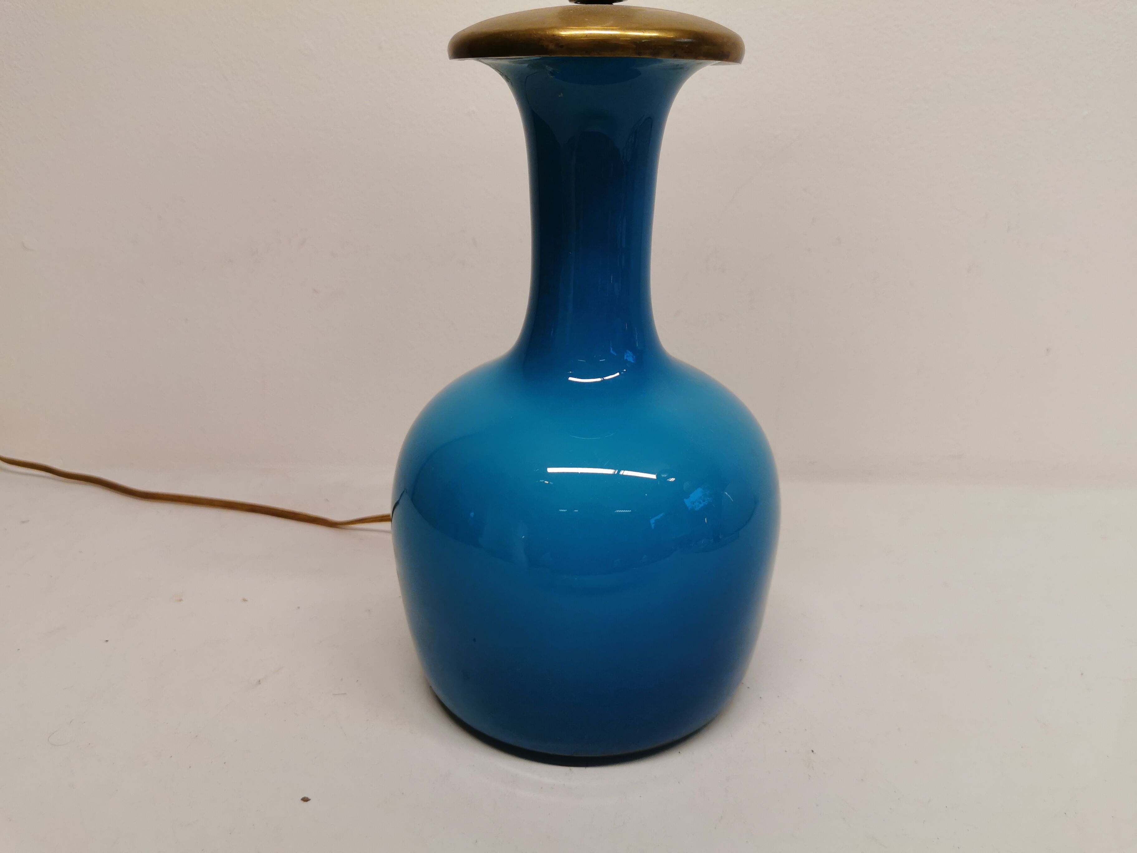 Sea blue glass lamp with brass top