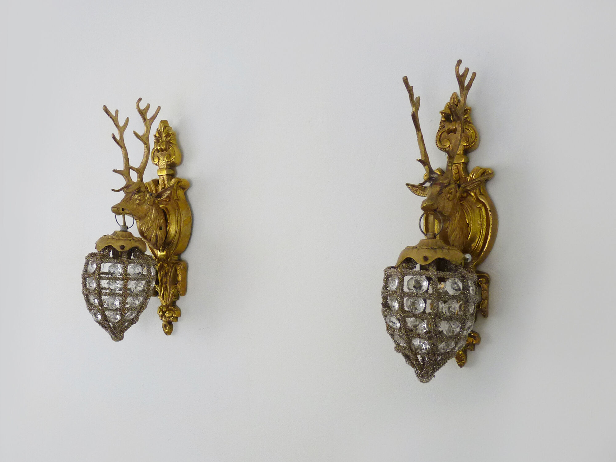 Pair of vintage wall lamps with pearl deer head and glass grapevines