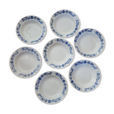 7 assiettes creuses motif floral, signées ЗиК