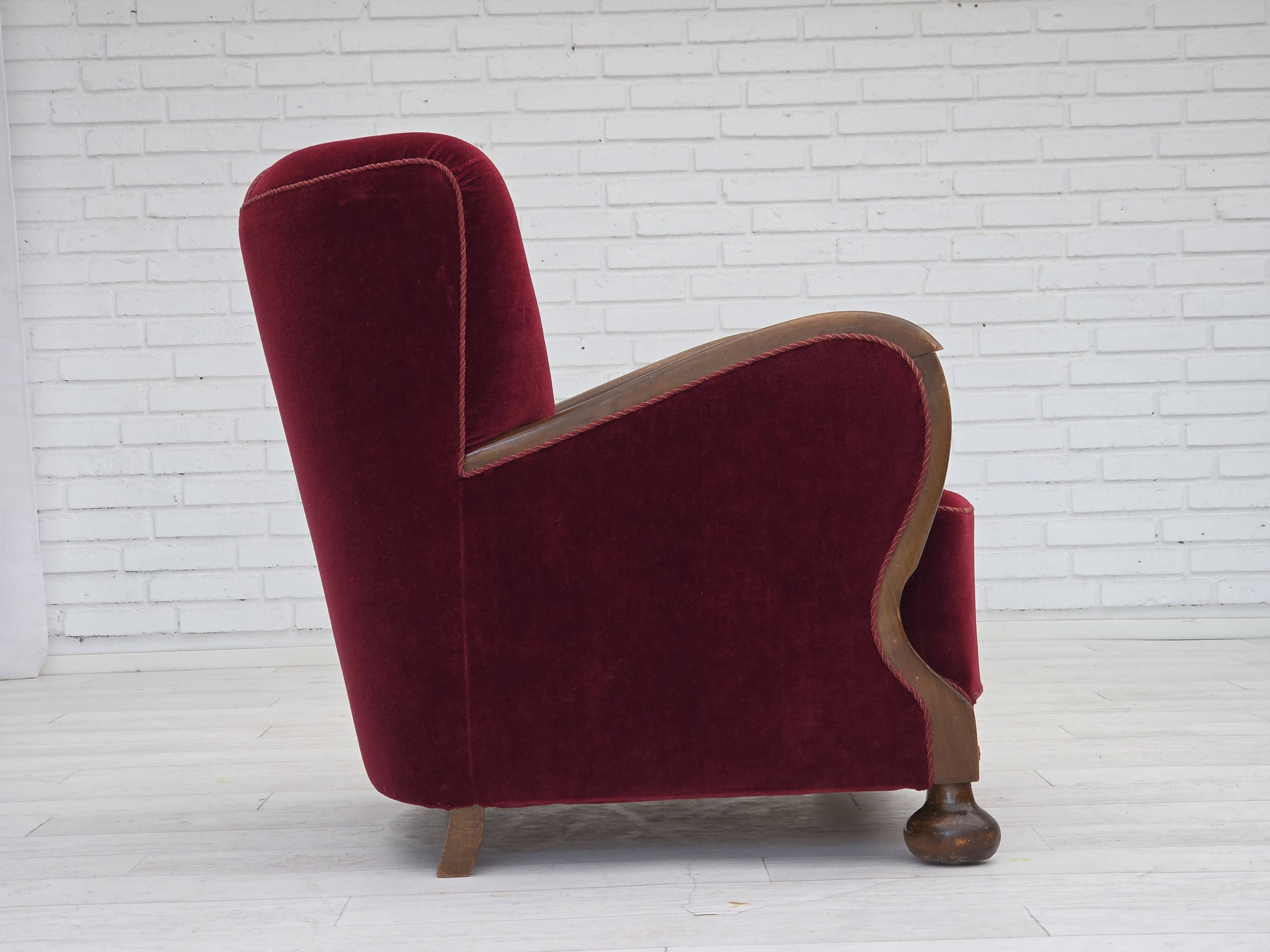 1950s, Danish relax armchair, cherry-red furniture velour, dark beech wood.