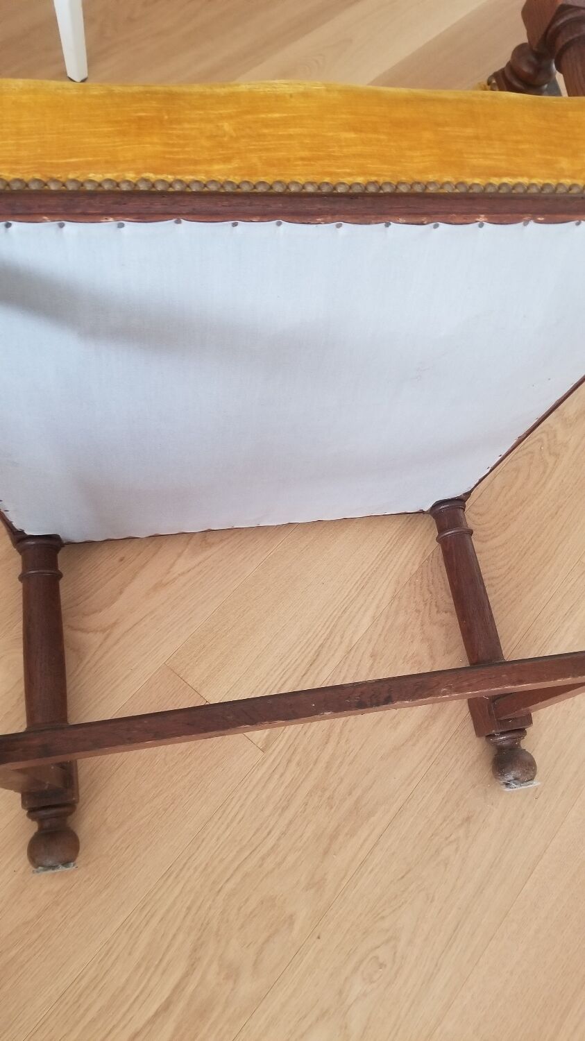 Mustard yellow wooden and velvet armchair