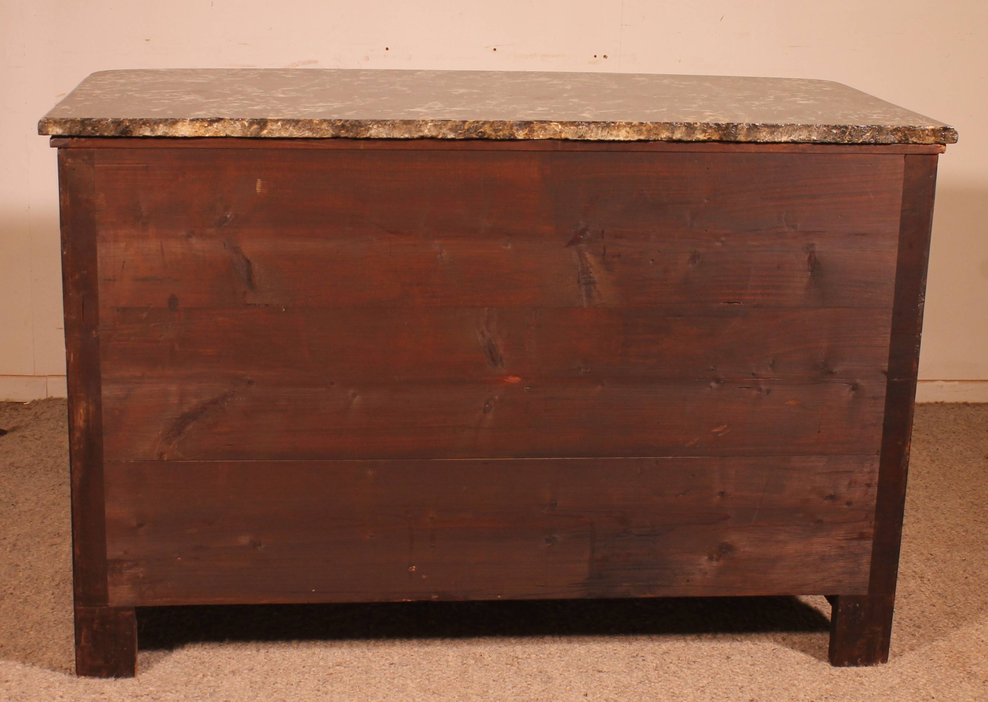 Dauphiné commode from the Louis XIV period in olive wood marquetry.