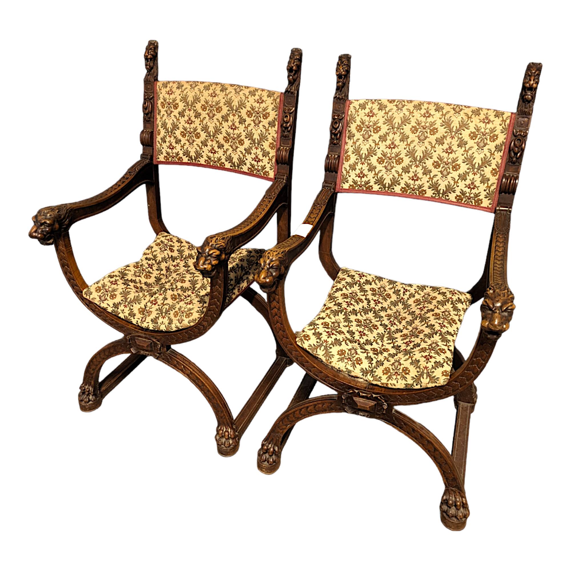Pair of Renaissance style walnut armchairs