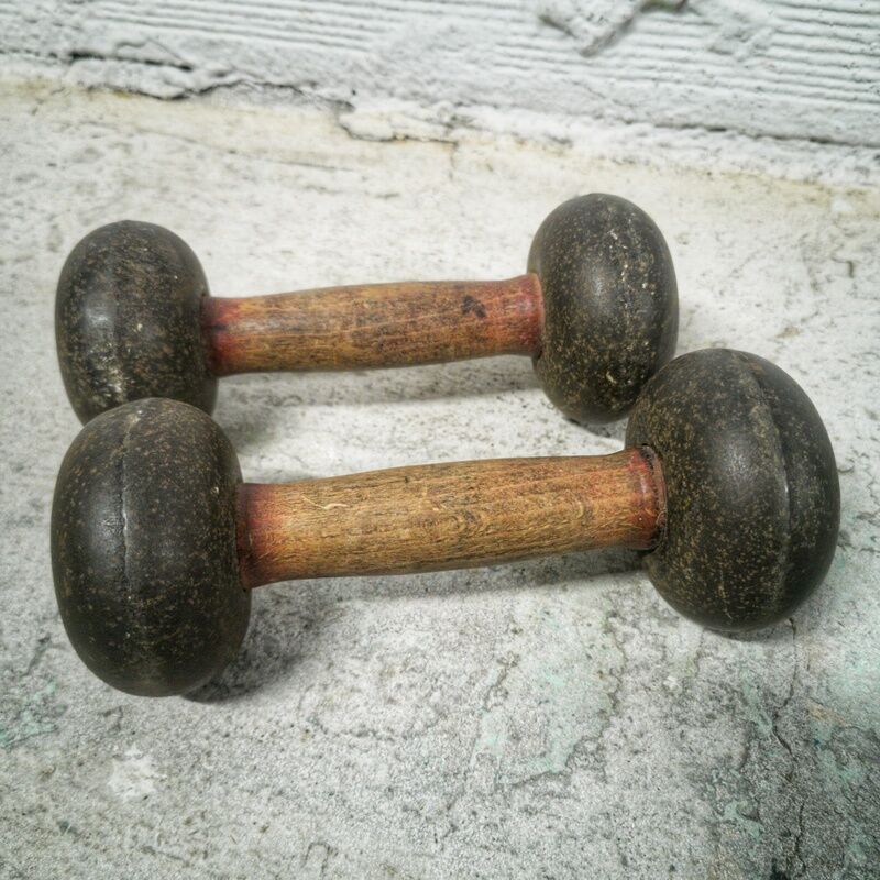 Pair of vintage dumbbells in cast iron and wood