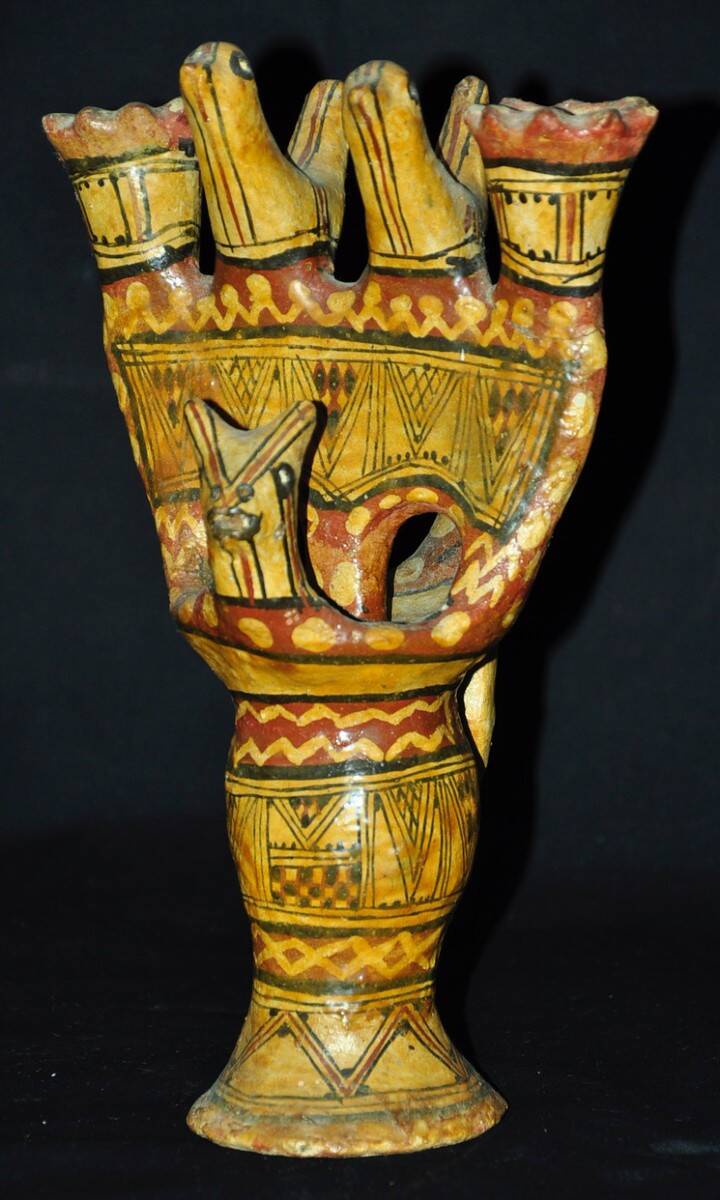 Late 19th century Kabyle pottery candlestick with polychrome geometric decoration