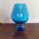 Vintage vase in light blue glass.