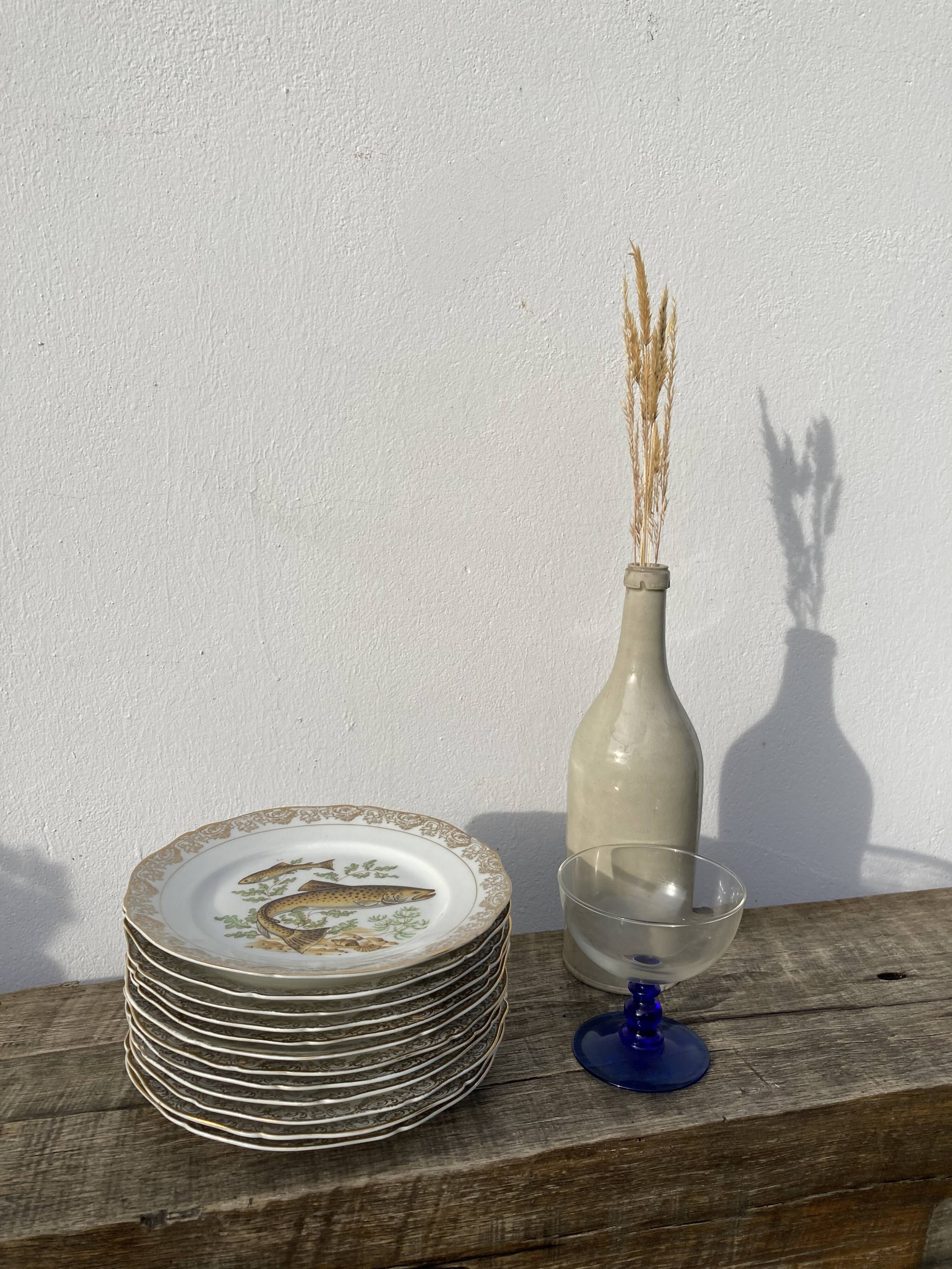 11 vintage Limoges porcelain fish plates