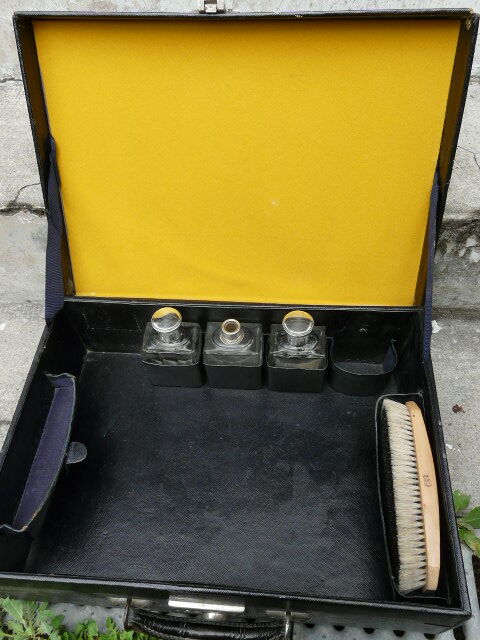 Leather suitcase with baron's crown and mw monogram