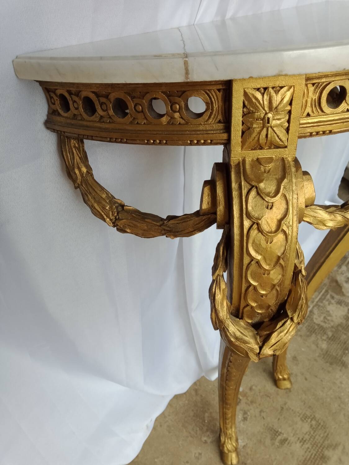 Louis XVI style console in gilded wood