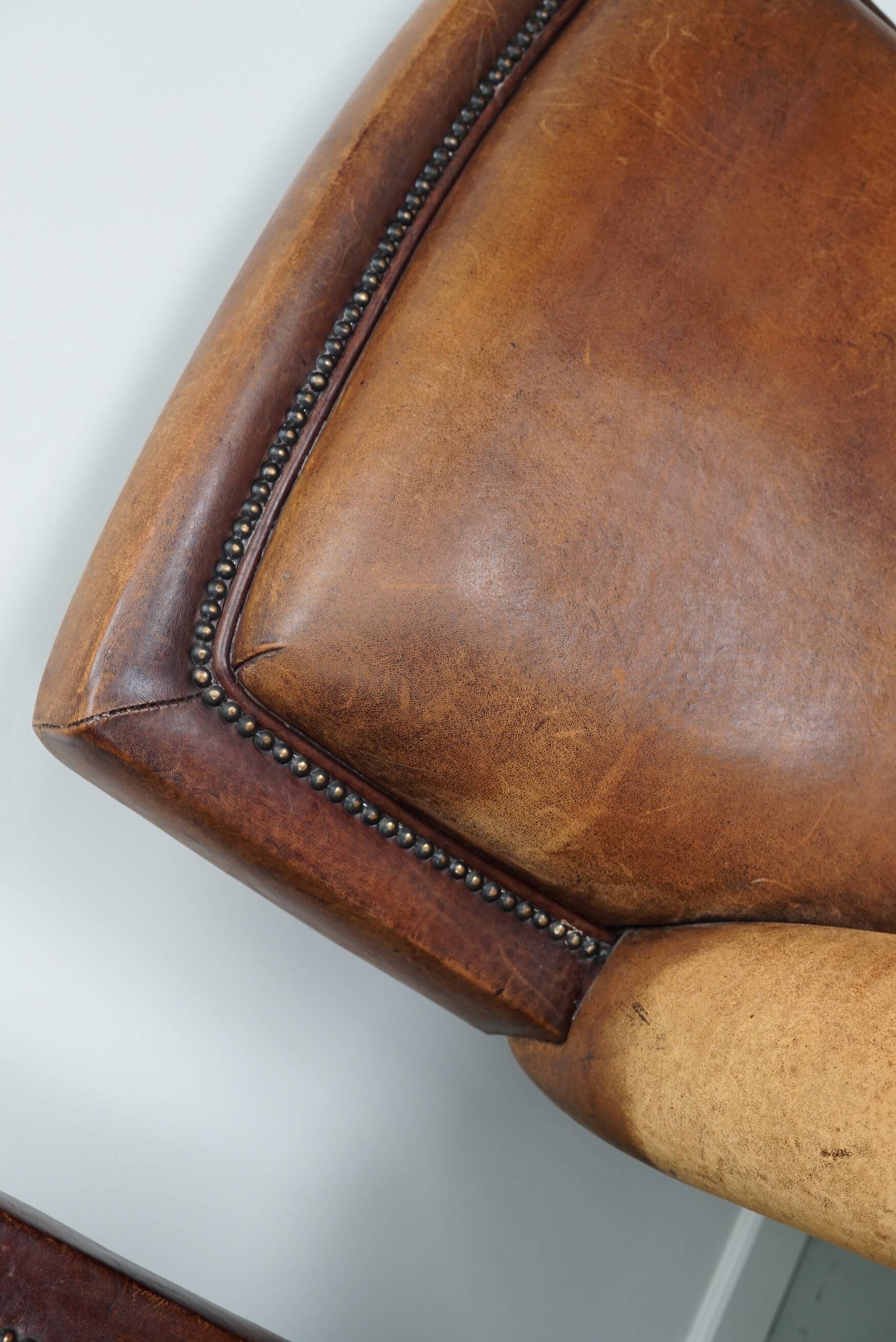 Vintage dutch cognac colored leather club chairs