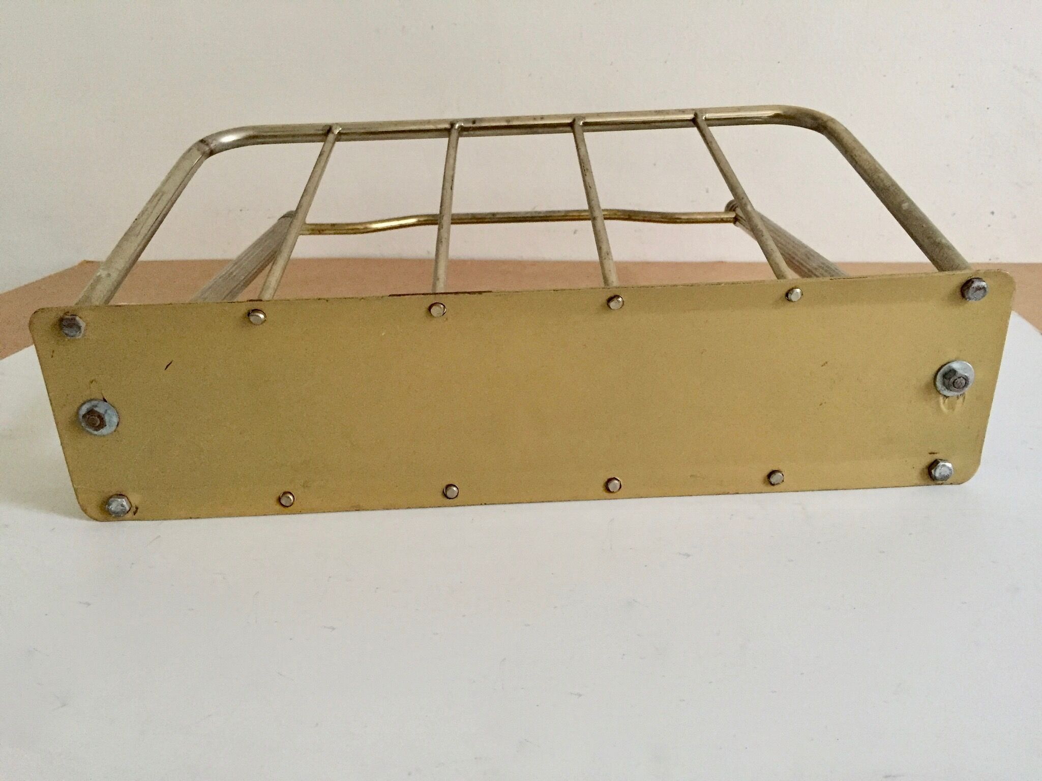 Golden magazine rack