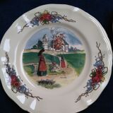 12 plates of the Obernai earthenware décor service signed Henri Loux