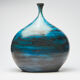 Large blue vase with ceramic rider by Jean de Lespinasse