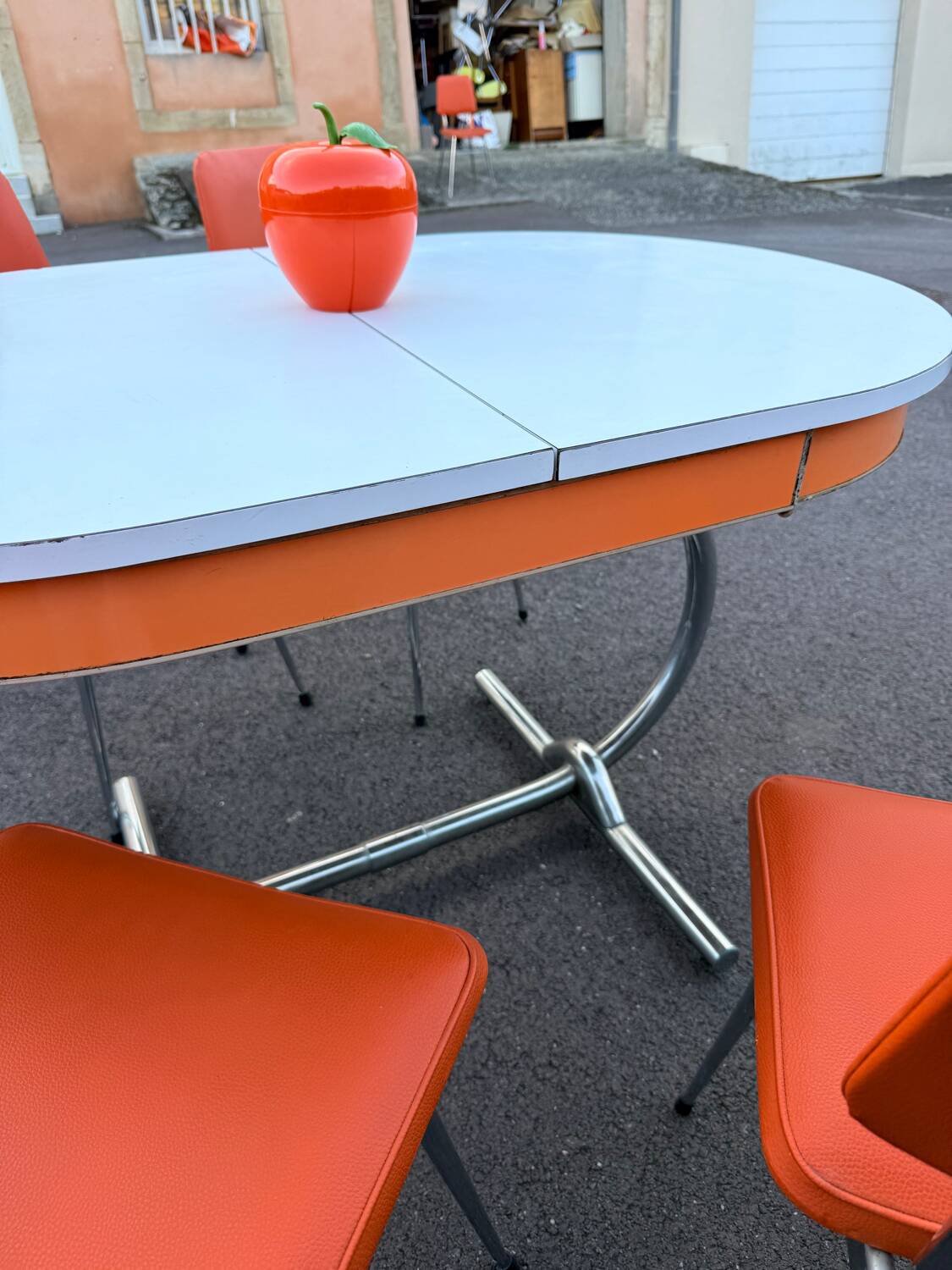 Formica leatherette chair with orange table, vintage 70s Space Age