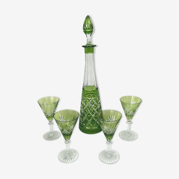 Set of a decanter and four green cut crystal glasses