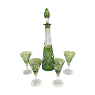 Set of a decanter and four green cut crystal glasses