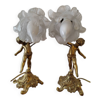 Pair of bronze cherub lamp