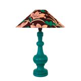Old lamp with green turned wooden base and printed conical lampshade