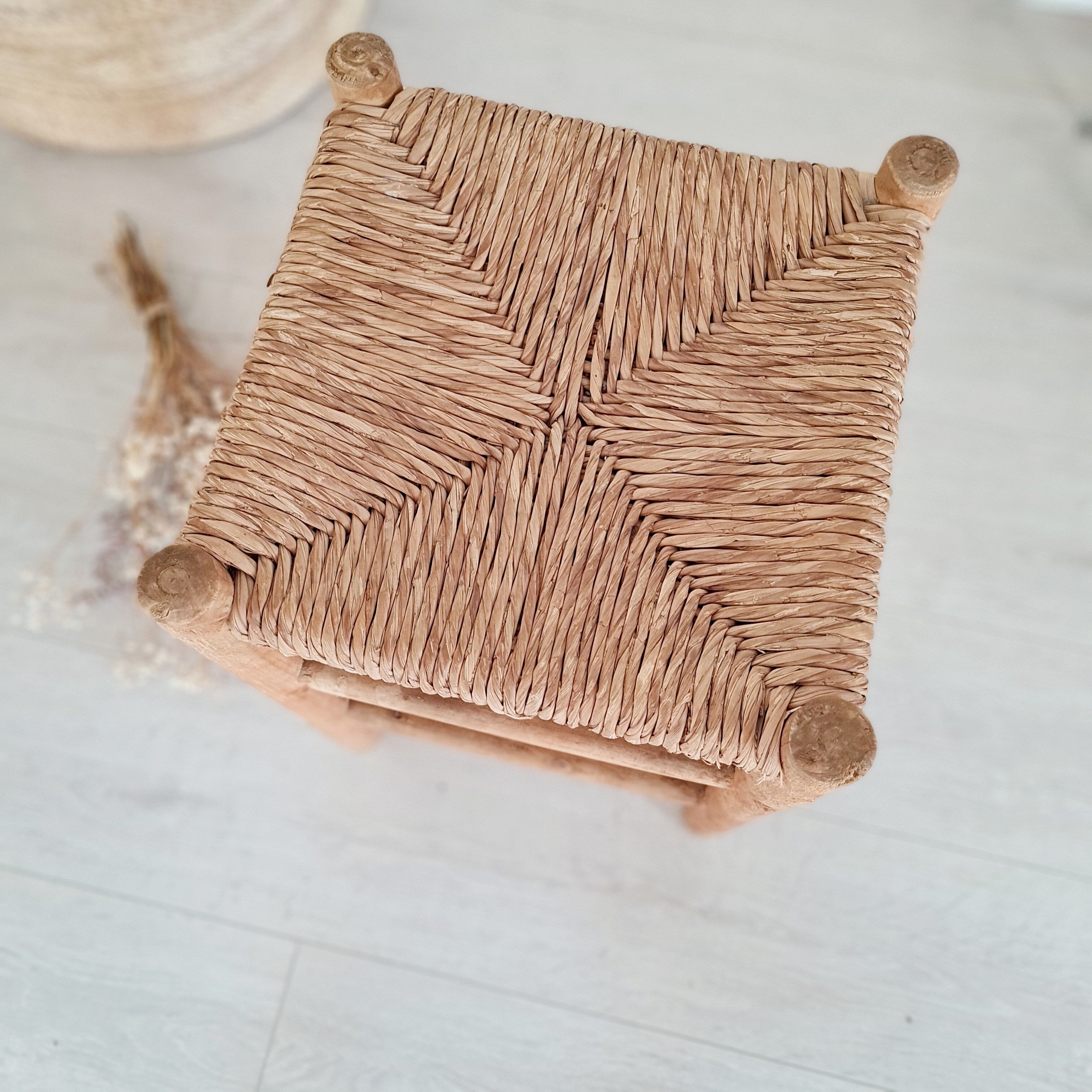 Old stool in wood and straw brutalist look