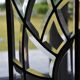 Deux vitraux en verre biseauté et laiton