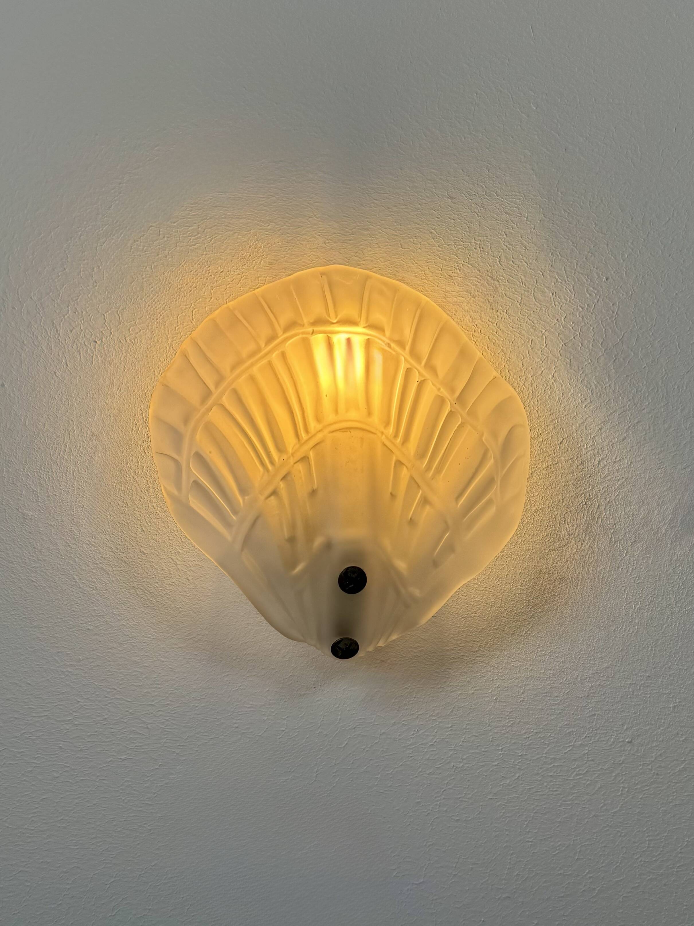 Pair of shell wall lights, frosted glass, France, 1970.
