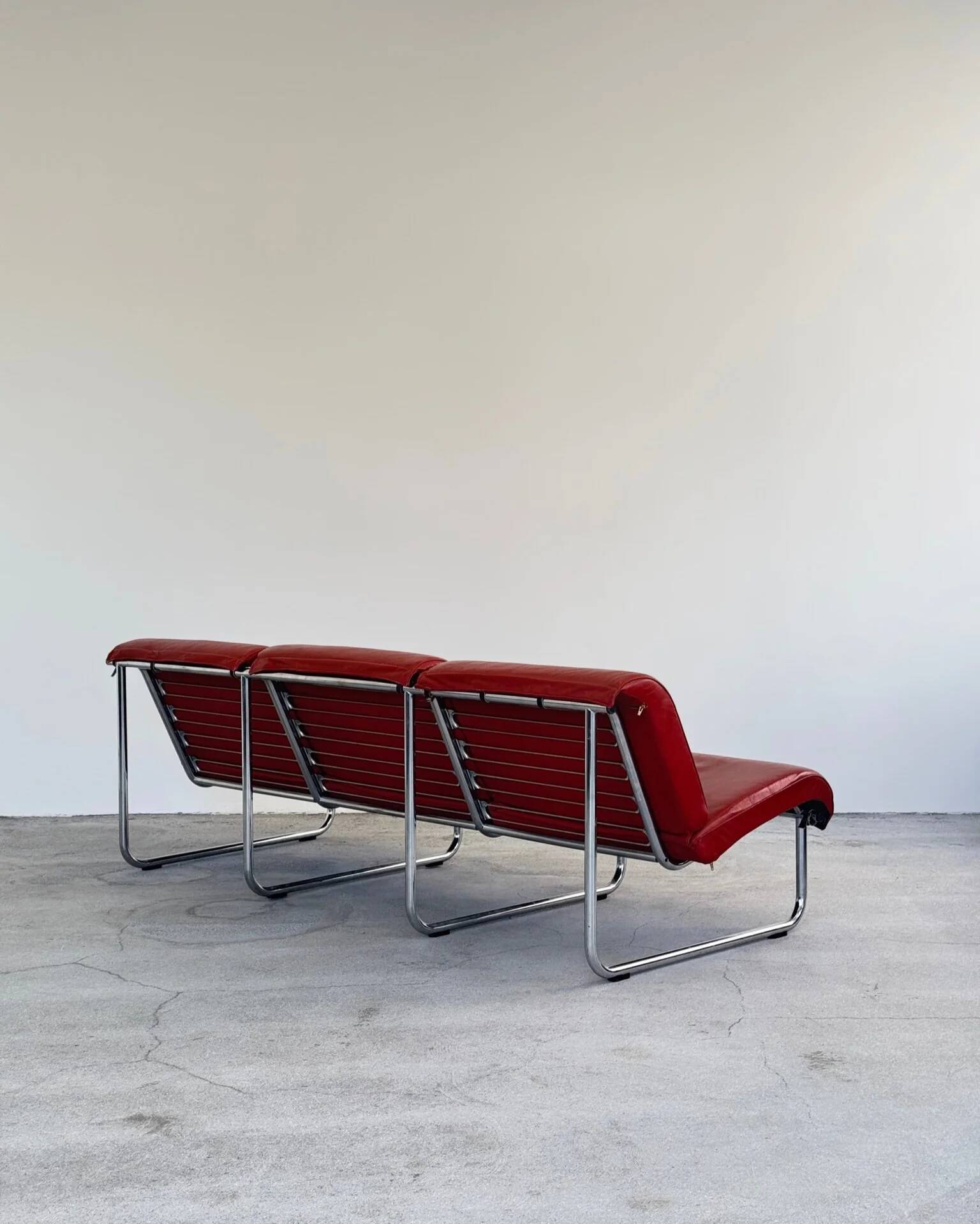 Red leather Remmi sofa by Yrjö Kukkapuro