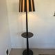 Vintage floor lamp in black patinated wood and striped lampshade