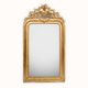 Louis-Philippe mirror from the 19th century with vase and crown of flowers.