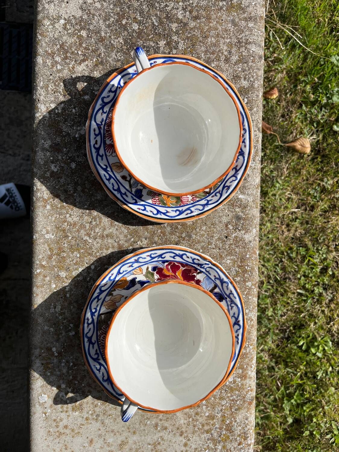 Gien earthenware tea cups and saucers with peony decor