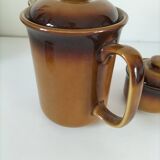 Coffee pot and sugar bowl in glazed stoneware, deep brown glazes.