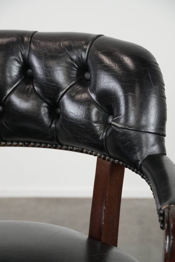 Adjustable black timeless Chesterfield office chair made of cow leather
