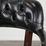 Adjustable black timeless Chesterfield office chair made of cow leather
