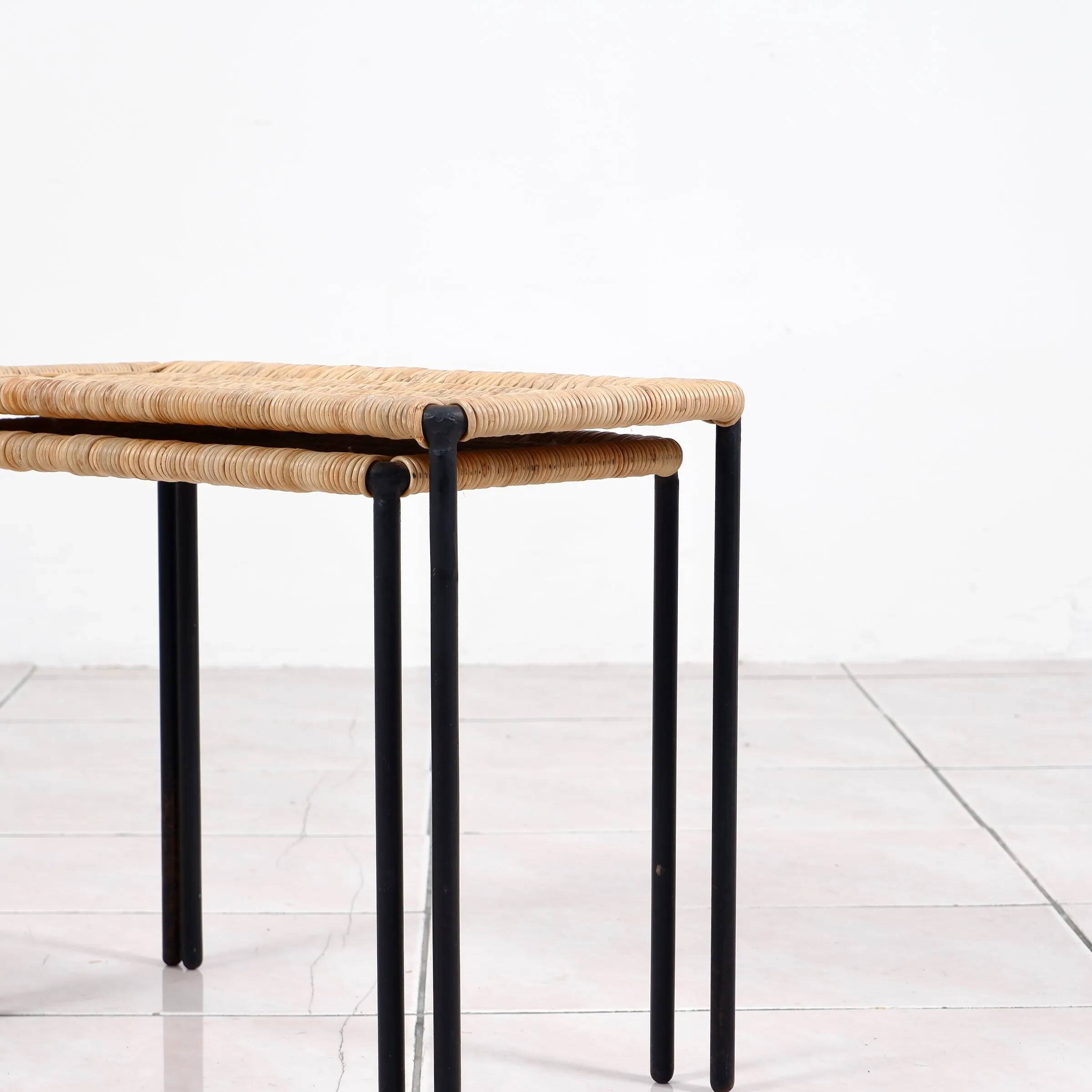 Nesting tables in metal / rattan by Carl Auböck