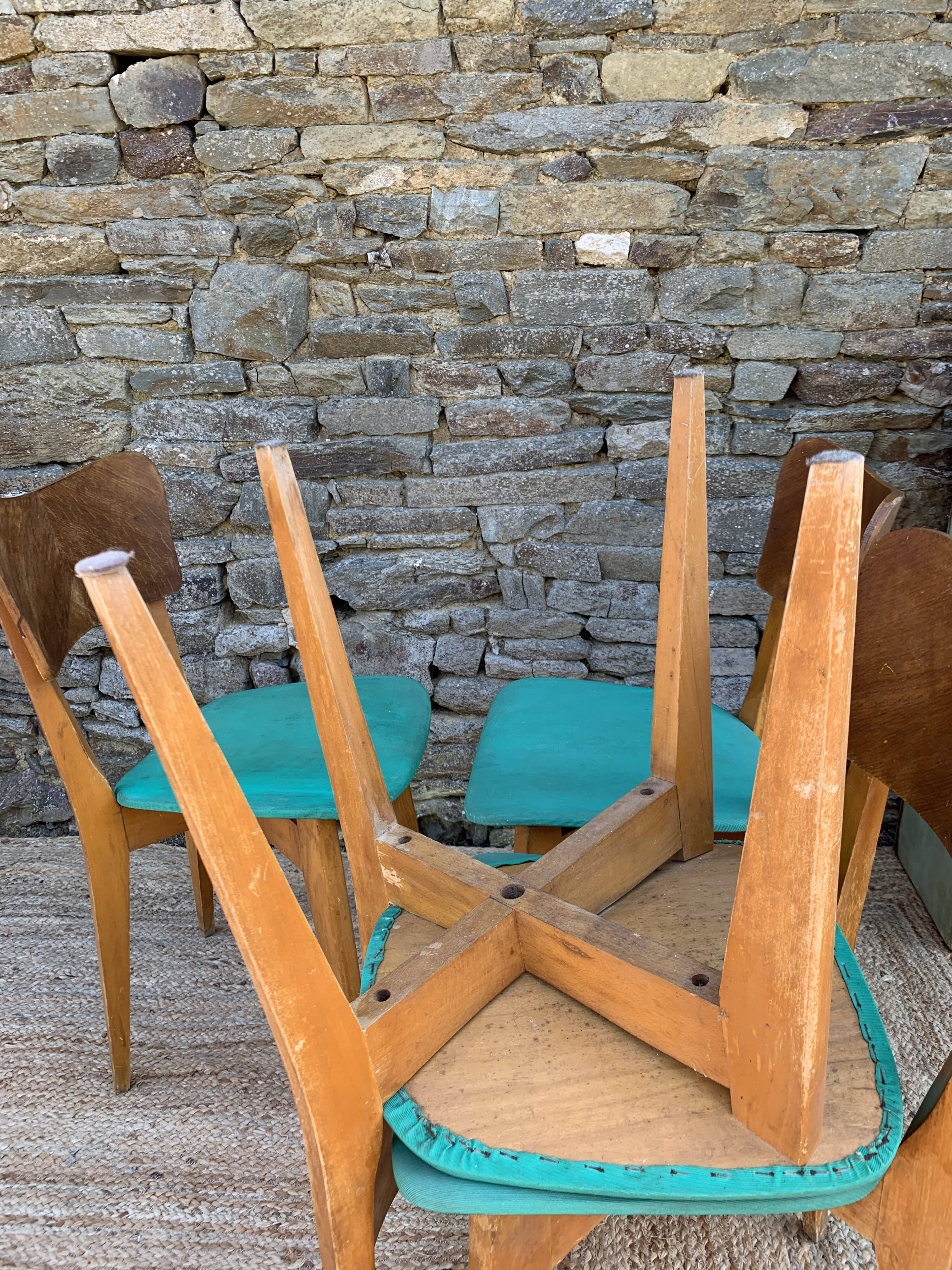 Set of 4 vinyl and wood chairs