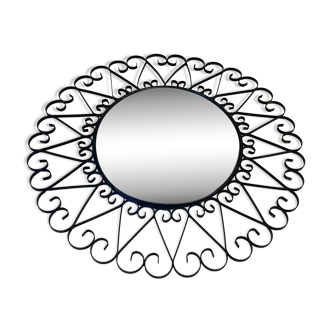Round sun mirror with convex witch's eye in wrought iron Chaty Vallauris ironworks 1960