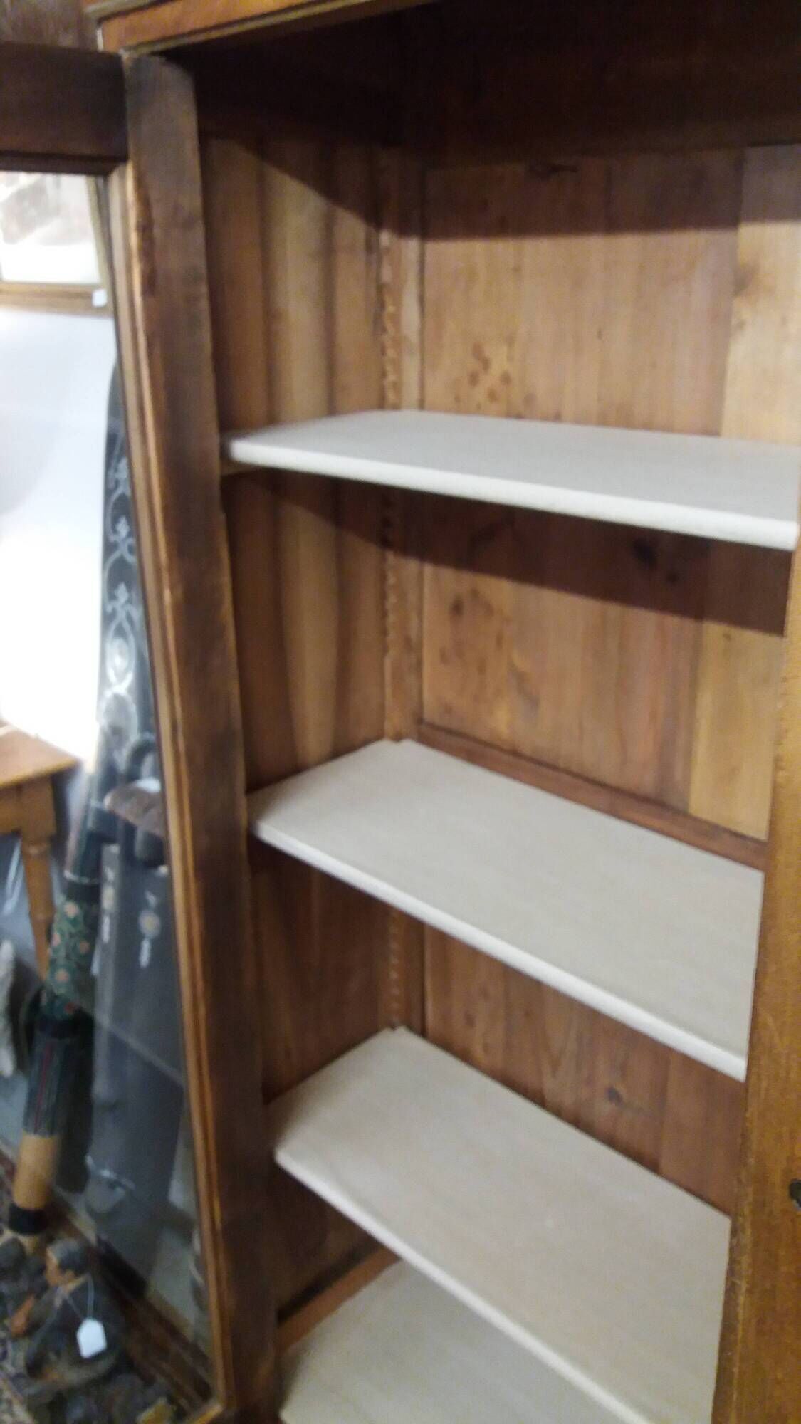 Two-door display cabinet in transitional style.