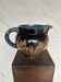 Mixed earth pitcher