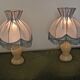 Pair of marble bedside lamps with blue satin fringed shades