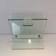 Designer magazine rack in glass and brushed steel