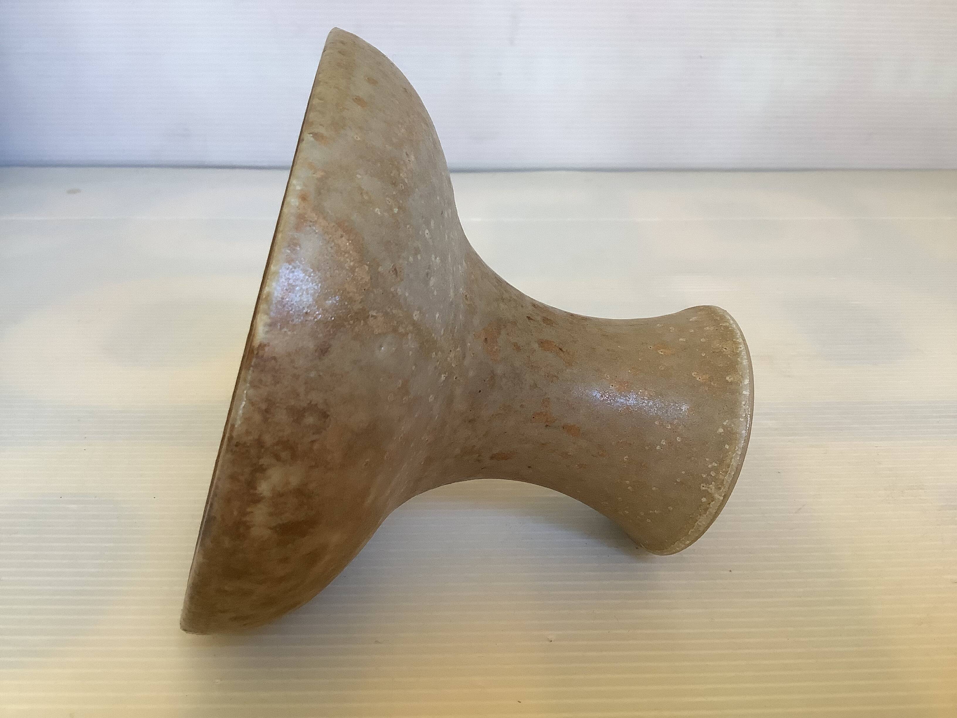 Beige ceramic chalice-shaped candle holder