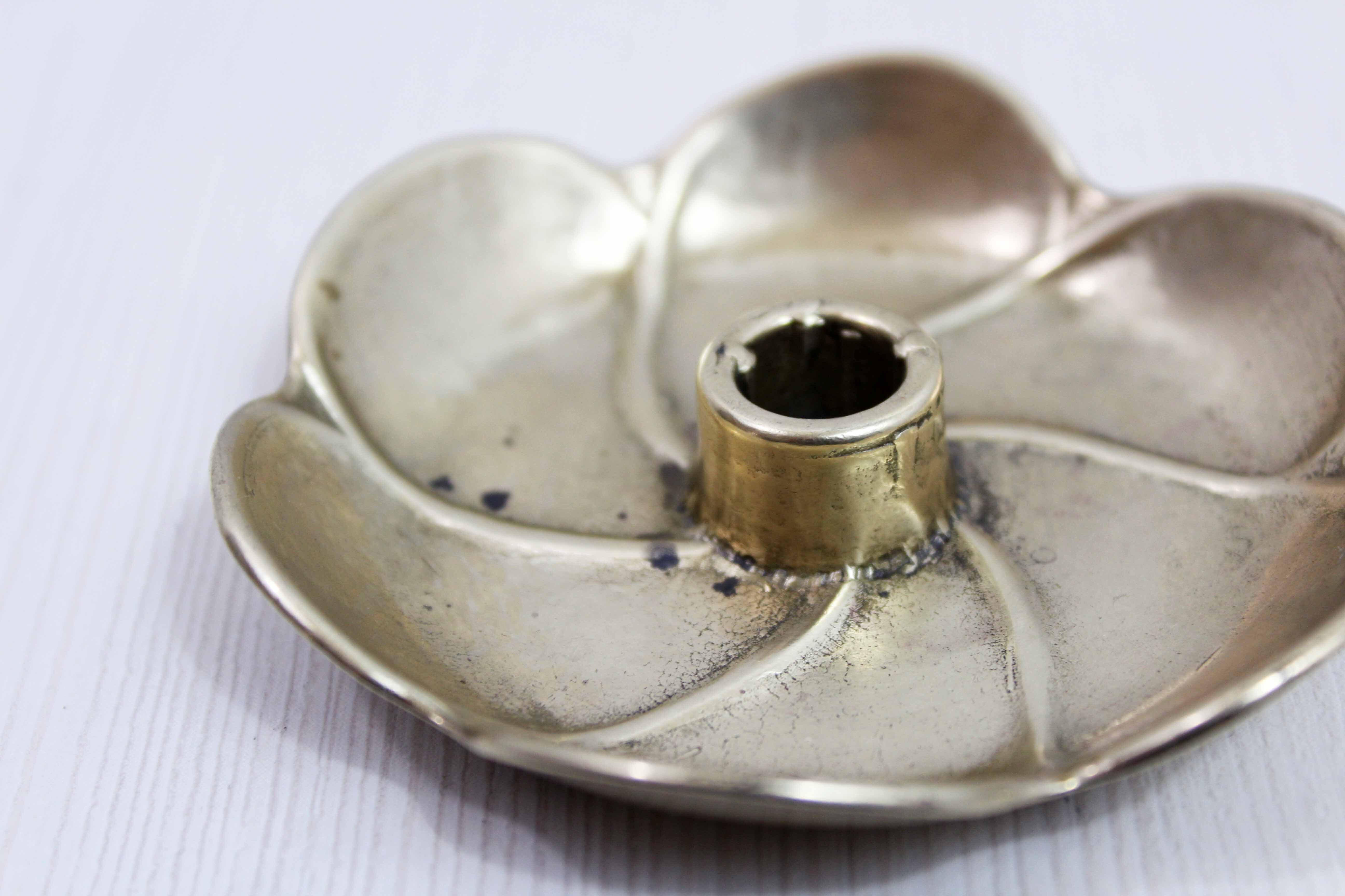 Brass flower candle holder