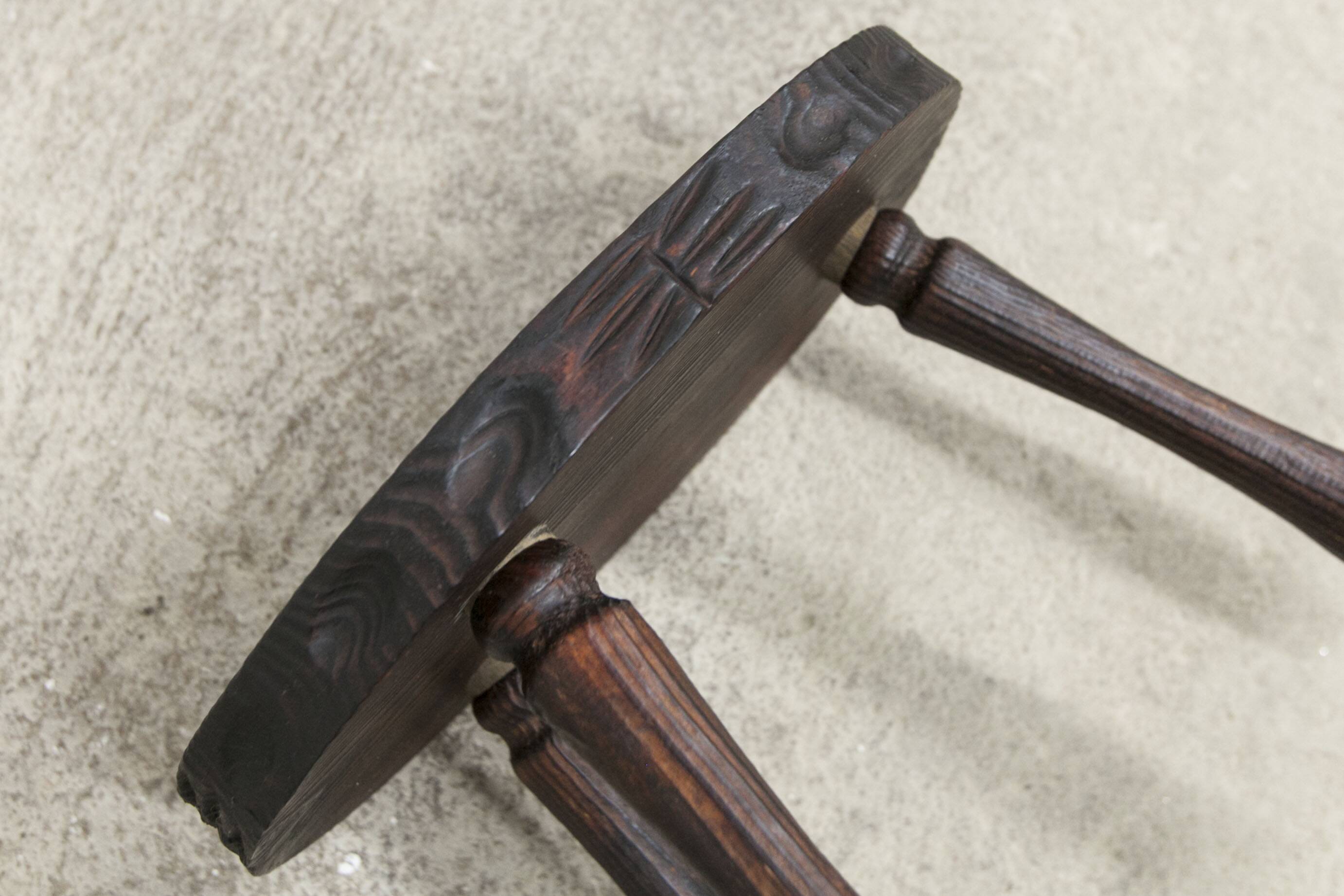Low brutalist solid wood stool 1950