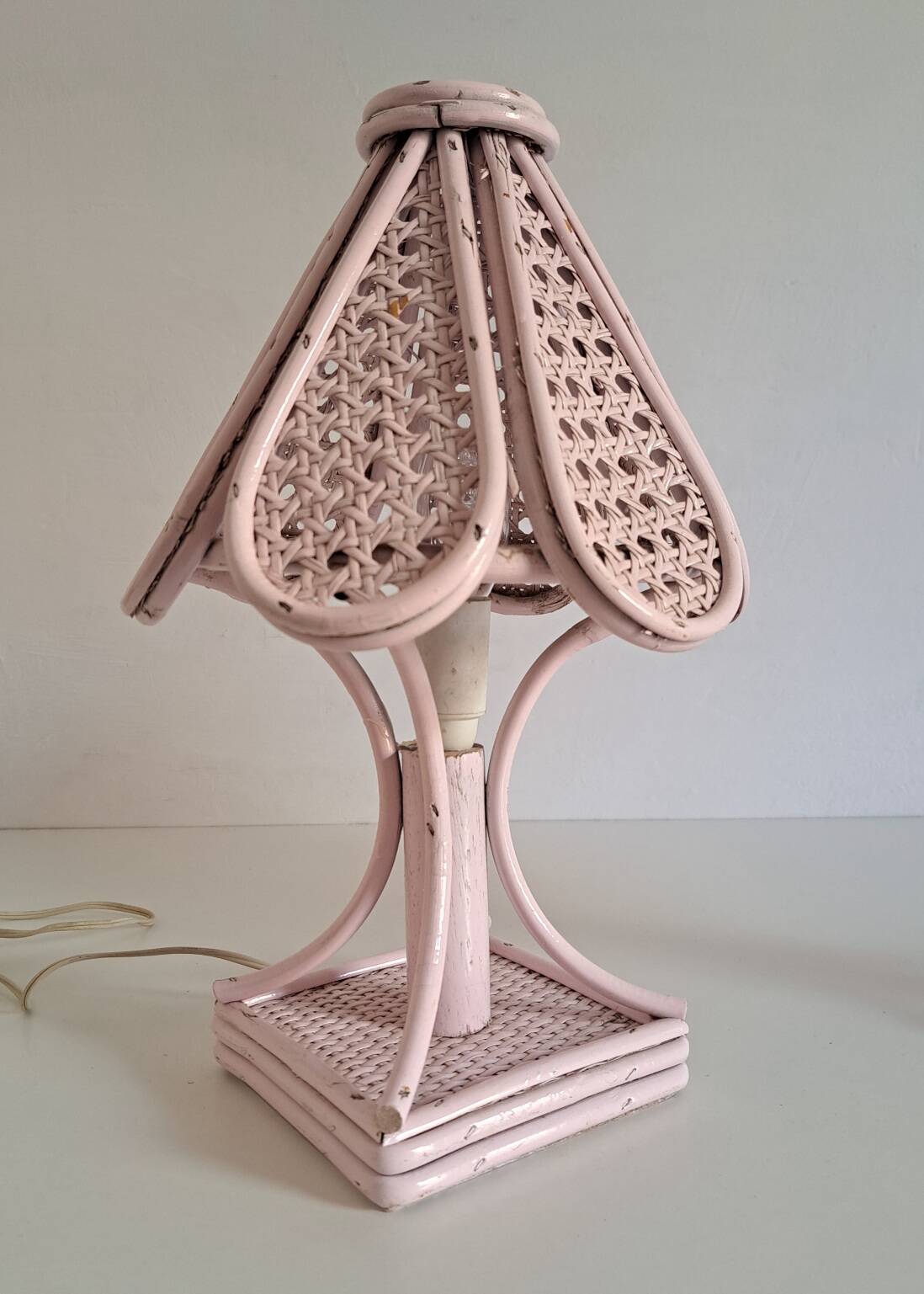 Pair of cane and bamboo bedside lamps