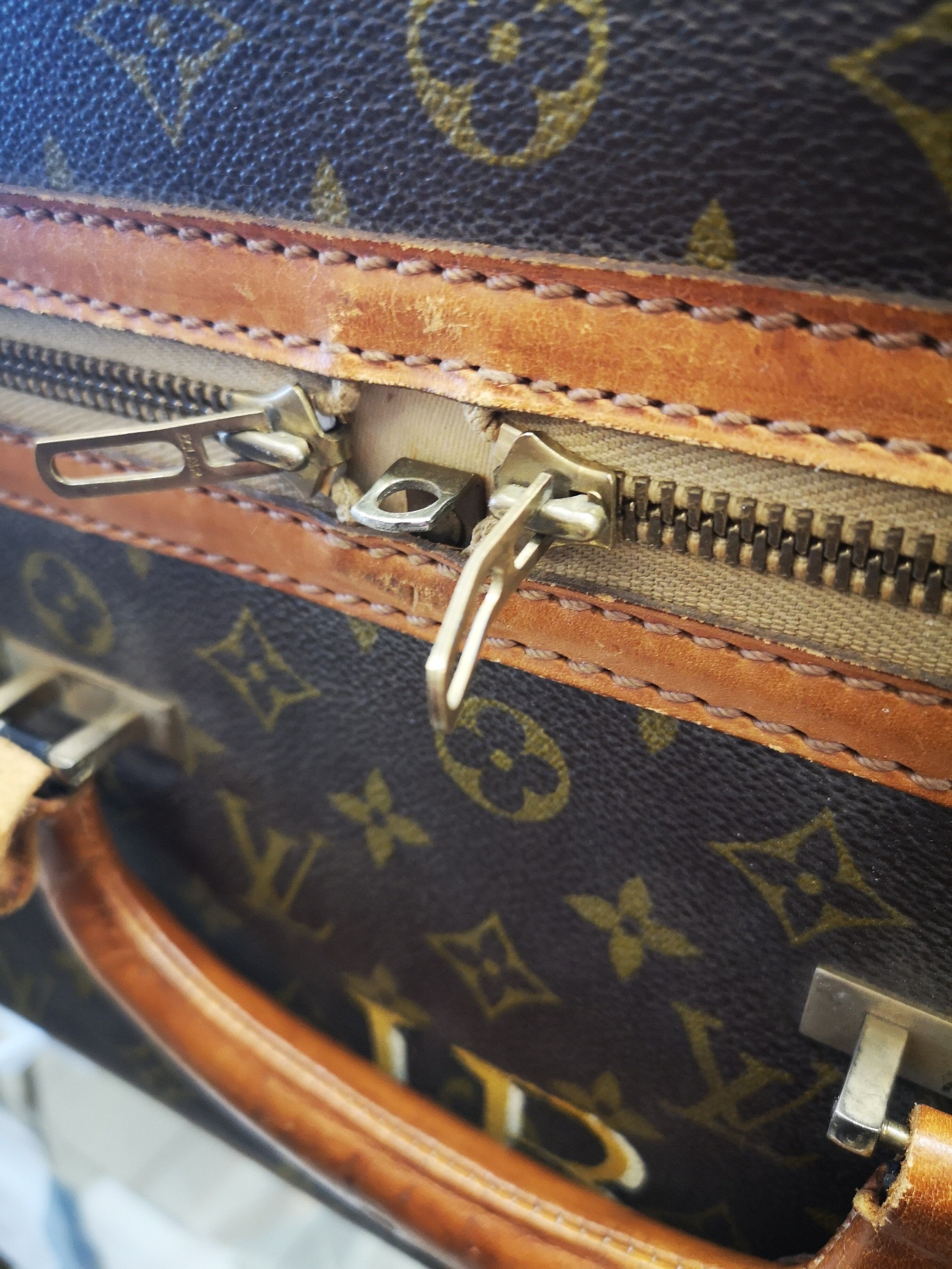 Louis Vuitton leather suitcase